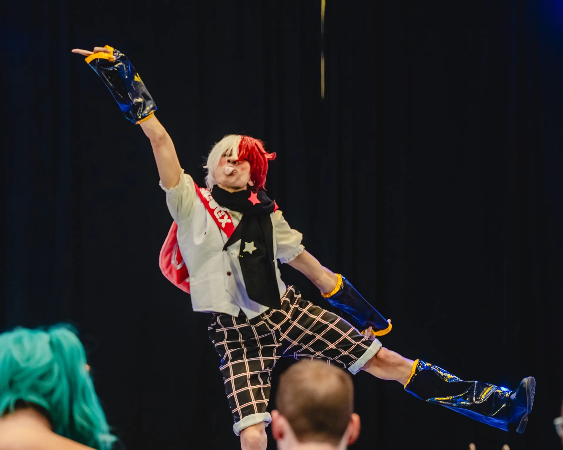 A masquerade contestant posing for the Matsuricon audience.